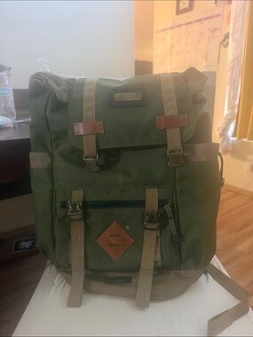 Olive Green Canvas Roll-Top Backpack with Tan Accents